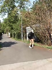 15 pictures - Hot blonde Naomi squats on the road to piss