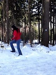 15 pictures - Dark haired babe pisses in the snow outside