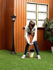 15 pictures - Pretty European relieves herself in plant pot