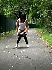 15 pictures - Exotic babe pulls down her leggings to piss