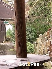 15 pictures - Redhead in knee high socks pisses outside