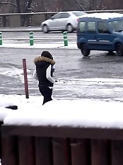 15 pictures - Watch the snow melt as this dark haired babe pees