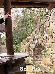 15 pictures - Redhead in knee high socks pisses outside