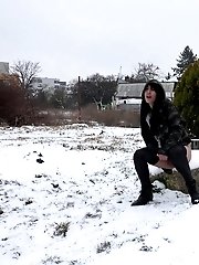 15 pictures - Stunning dark haired girl pisses out in the snow