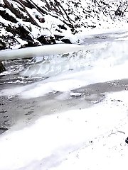 15 pictures - Sexy lady relieves herself on a snow