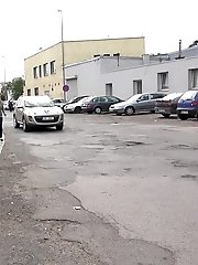 15 pictures - Busty brunette pees behind a bus