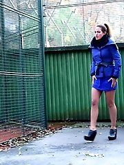 15 pictures - Brunette squats low to piss outside