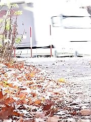 15 pictures - Blonde in check skirt pisses on the ground