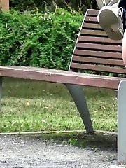 15 pictures - Gorgeous redhead lifts up her legs to piss outside