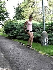 15 pictures - Hot brunette standing to pee against lamp post