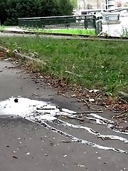 15 pictures - Brunette leaves a trail of piss on the ground