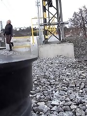 15 pictures - Hot blonde pisses right next to a railway line
