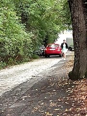 15 pictures - Chubby girl pulls up her dress to piss outside