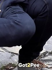 15 pictures - Antonia pees outside next to drainage pipe
