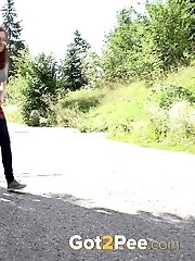 15 pictures - Cute babe rushes to beat her pee desperation