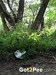 15 pictures - ass is on full view in this outdoor peeing scene