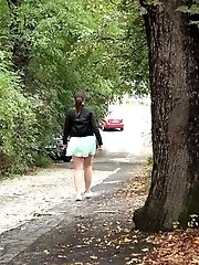 15 pictures - Chubby girl pulls up her dress to piss outside