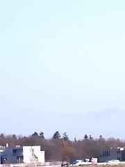 15 pictures - Gorgeous redhead sprays her piss on a driveway