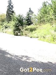 15 pictures - Cute babe rushes to beat her pee desperation