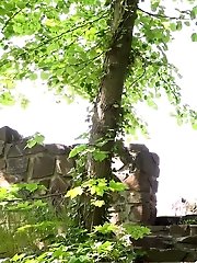 15 pictures - Dark haired babe pisses down stone steps