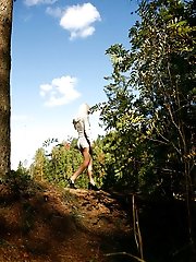 16 pictures - Shameless young blonde tart caught peeing on forest path