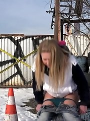 15 pictures - Violette squats in the snow to piss outside