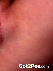 15 pictures - Redhead in knee high socks pisses outside