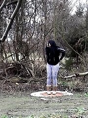 15 pictures - Black haired teen keeps on peeing outside