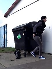 15 pictures - Dark haired girl is desperate to pee when walking