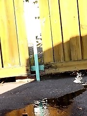 15 pictures - Raven haired babe leaves a piss puddle outside