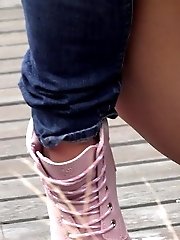 15 pictures - Dark haired girl squats to piss on decking