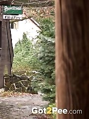 15 pictures - Redhead in knee high socks pisses outside