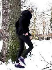 15 pictures - Cute blonde pisses in the snow outside