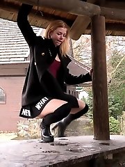 15 pictures - Redhead in knee high socks pisses outside