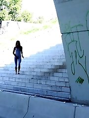 15 pictures - Beautiful raven haired girl sprays her golden pee