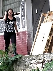 15 pictures - Stunning brunette is desperate to pee outside
