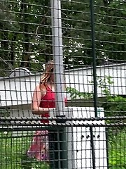 15 pictures - Cute girl in pink heels sprays her pee outside