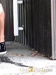 15 pictures - Pretty brunette makes a pissy puddle outside