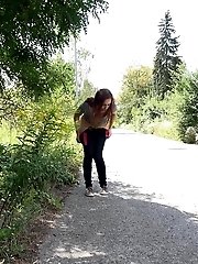 15 pictures - Cute babe rushes to beat her pee desperation