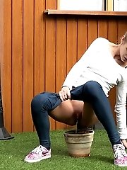 15 pictures - Pretty European relieves herself in plant pot