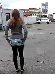 15 pictures - Busty brunette pees behind a bus