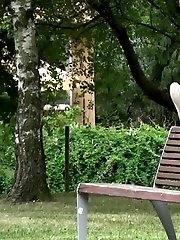 15 pictures - Gorgeous redhead lifts up her legs to piss outside