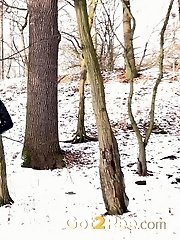 15 pictures - Sexy lady relieves herself on a snow