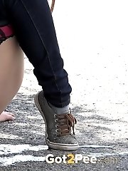 15 pictures - Cute babe rushes to beat her pee desperation