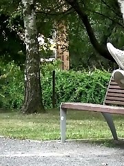 15 pictures - Gorgeous redhead lifts up her legs to piss outside