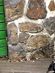 15 pictures - Pretty babe pisses onto a wooden terrace