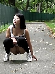 15 pictures - Exotic babe pulls down her leggings to piss