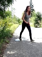 15 pictures - Cute babe rushes to beat her pee desperation