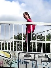 15 pictures - Brunette pulls down trousers to pee in public