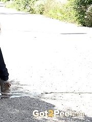 15 pictures - Cute babe rushes to beat her pee desperation